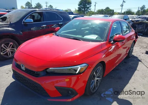 2023 Honda Civic Touring z USA, uszkodzony, nr VIN 2HGFE1F97PH323458